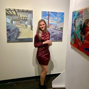 Long sleeve red silk dress.